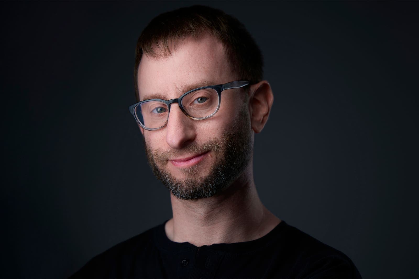Studio headshot of St. Louis photographer Zach Dalin