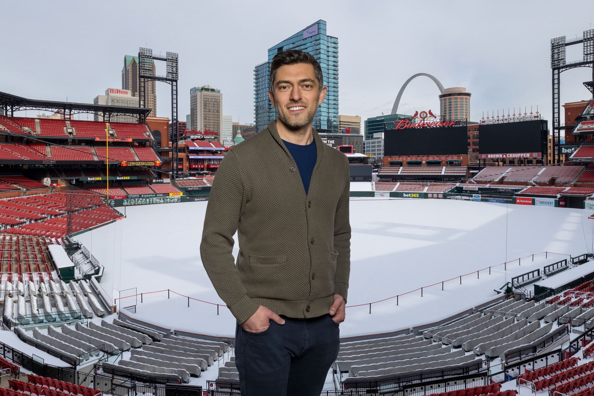 Executive portrait with the downtown St. Louis skyline and the Gateway Arch behind, by Zach Dalin Photography
